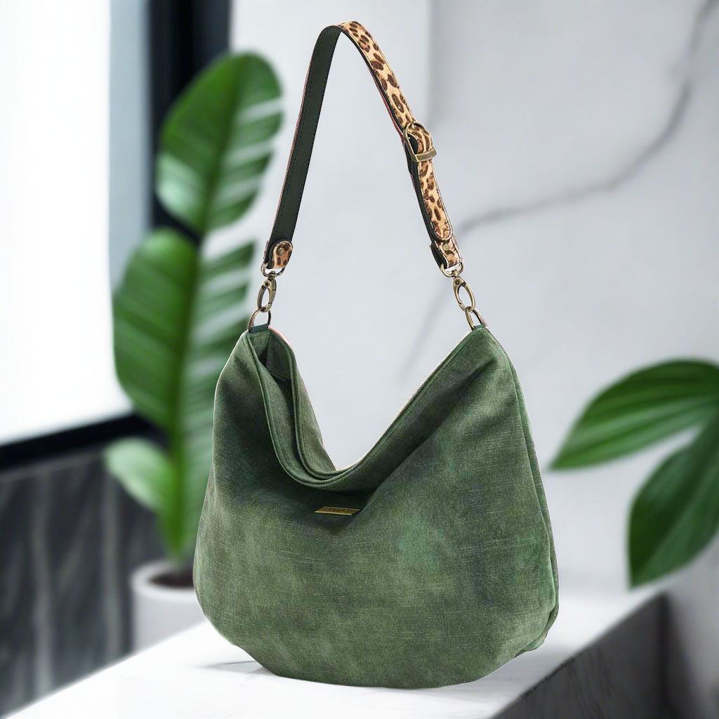 The Green Velvet Hobo Bag with a leather leopard print strap