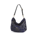 Angled view of Art Deco Velvet Hobo Bag displaying elegant hobo silhouette and Art Deco detailing by Umpie Handbags