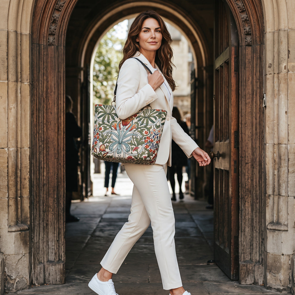 Model walking with the Arts & Crafts Work Bag, handmade heritage style by Umpie Handbags