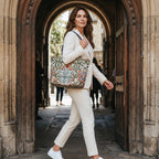 Model walking with the Arts & Crafts Work Bag, handmade heritage style by Umpie Handbags