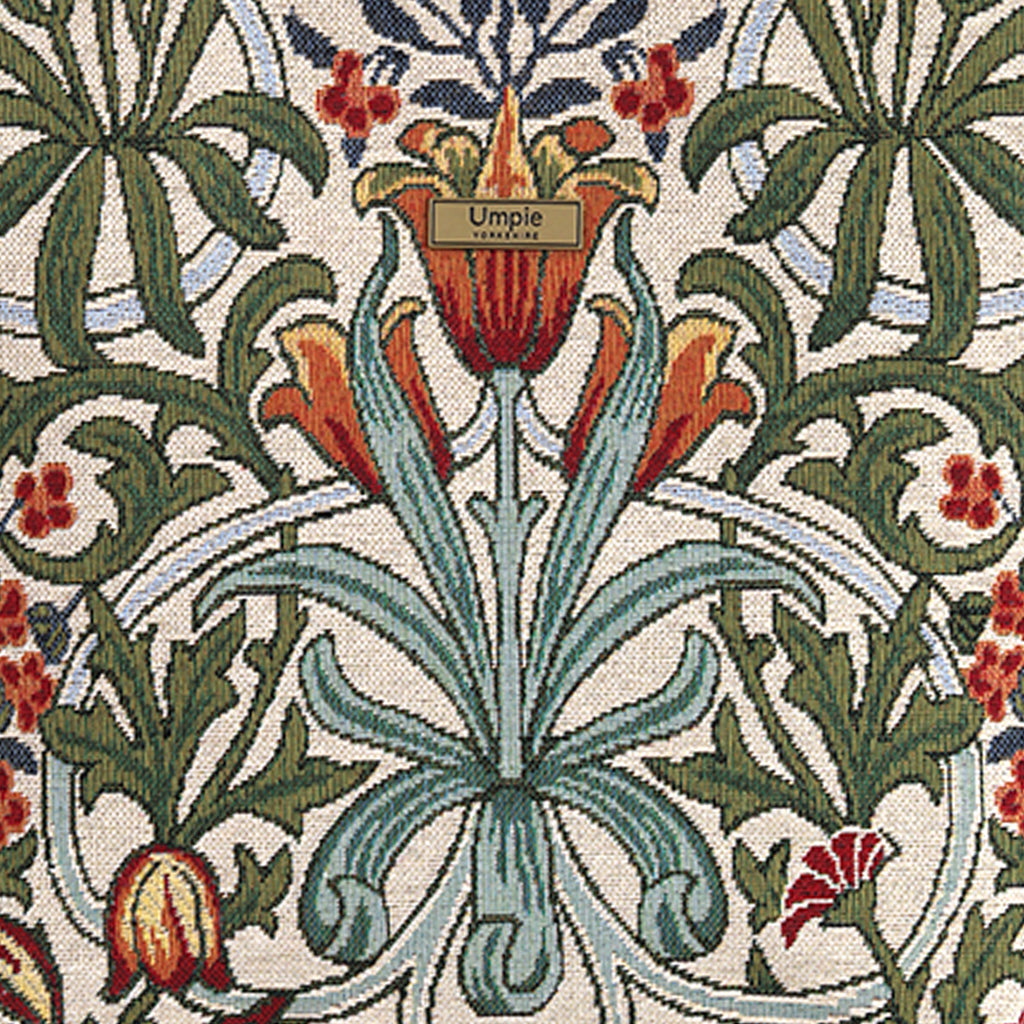Close-up of William Morris Arts & Crafts botanical tapestry fabric, rich trailing leaves and blooms in warm heritage tones, handcrafted quality by Umpie Handbags