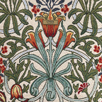 Close-up of William Morris Arts & Crafts botanical tapestry fabric, rich trailing leaves and blooms in warm heritage tones, handcrafted quality by Umpie Handbags