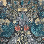 Close-up detail of artisan Batik linen fabric featuring traditional wax-resist patterns and rich textural depth by Umpie Handbags