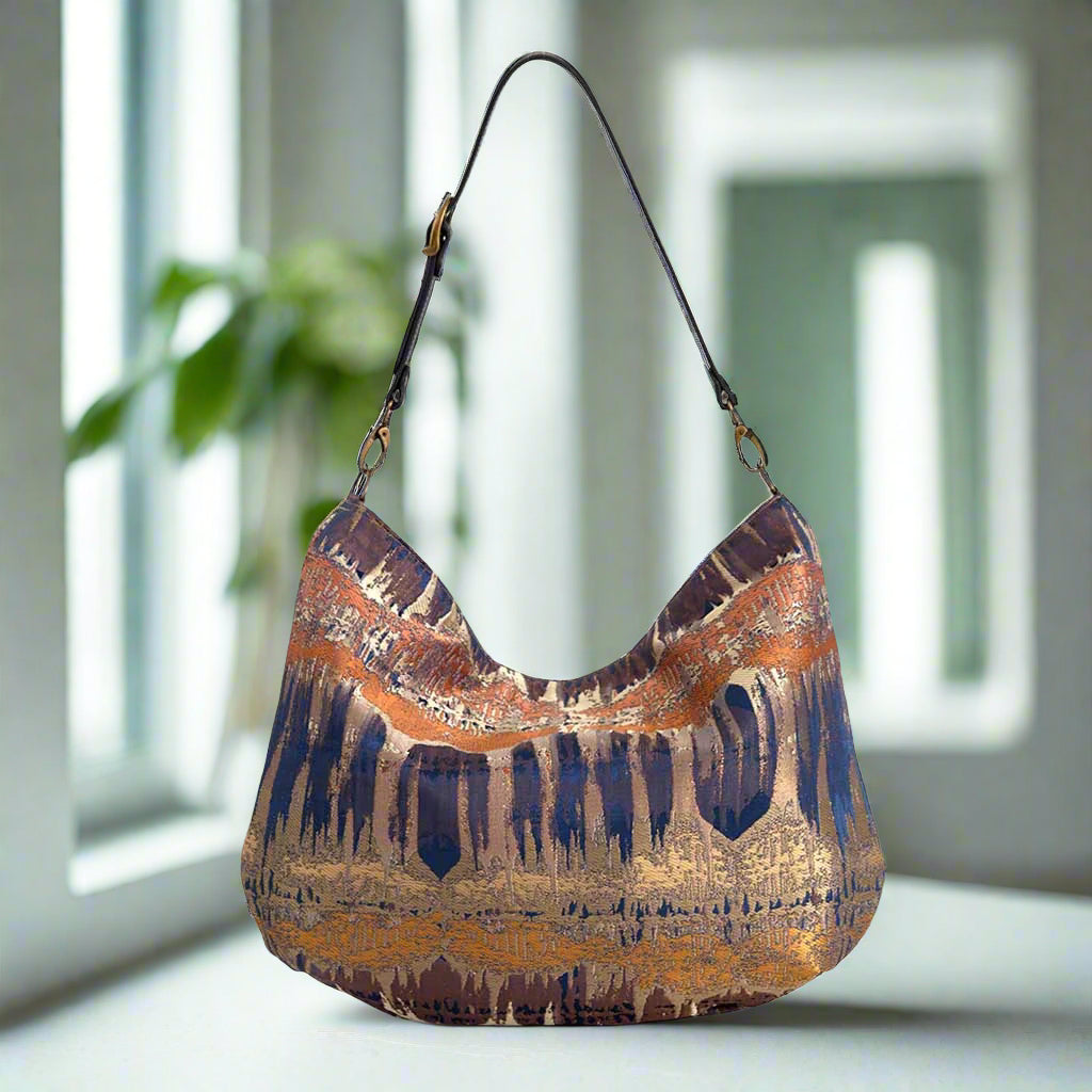 Back view of bronze metallic hobo bag showcasing intricate brocade pattern and British craftsmanship by Umpie Handbags