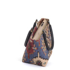 Top-down view revealing secure zip closure with quality hardware, black leather handle attachment detail, spacious interior opening, and heritage Kilim pattern canvas construction handcrafted in Yorkshire by Umpie Handbags