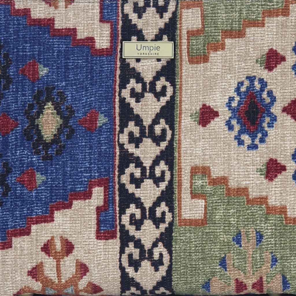 Canvas Shoulder Bag in multi-colour Kilim design with black leather straps. Fabric view.