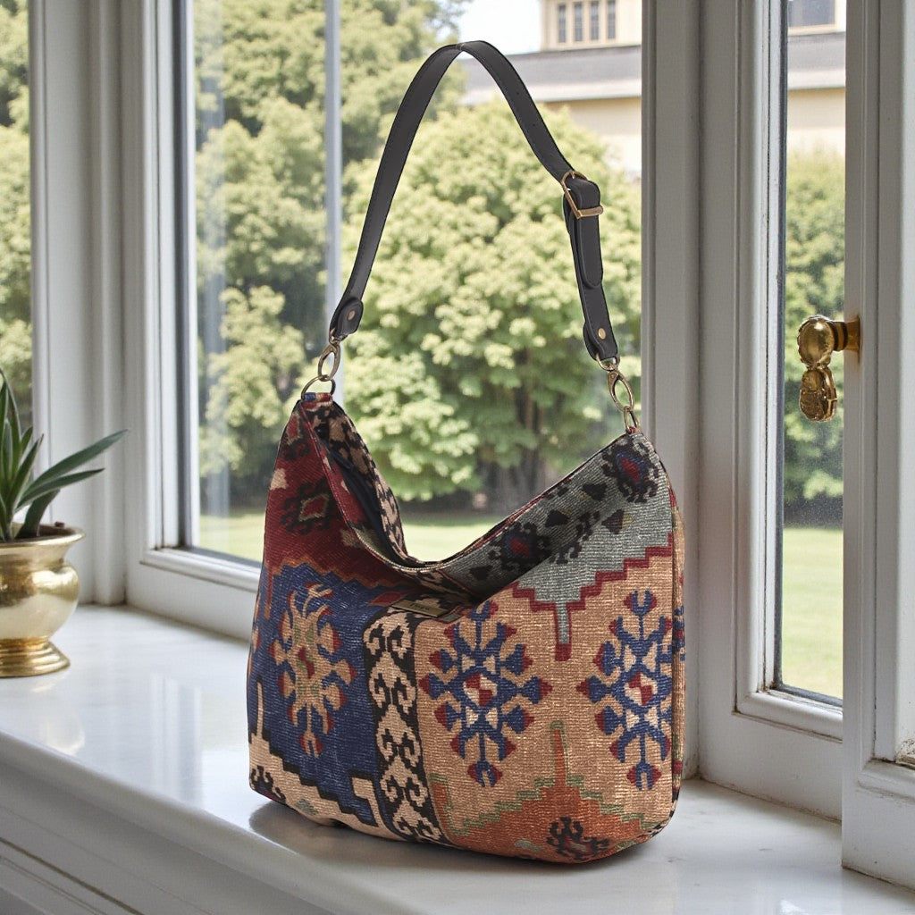 Angled view of Kilim Canvas Hobo Bag displaying durable canvas construction and traditional Kilim weaving by Umpie Handbags