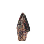 Top zip view of Kilim Canvas Hobo Bag worn over shoulder showing navy mix geometric patterns and relaxed silhouette by Umpie Handbags