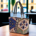 The Canvas Shoulder Bag with black leather straps