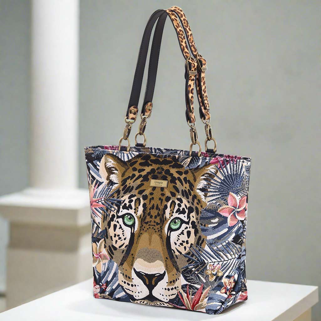 The Cheetah Tote Bag with animal print leather straps