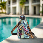 A Floral Crossbody Bag with a Leopard print leather strap