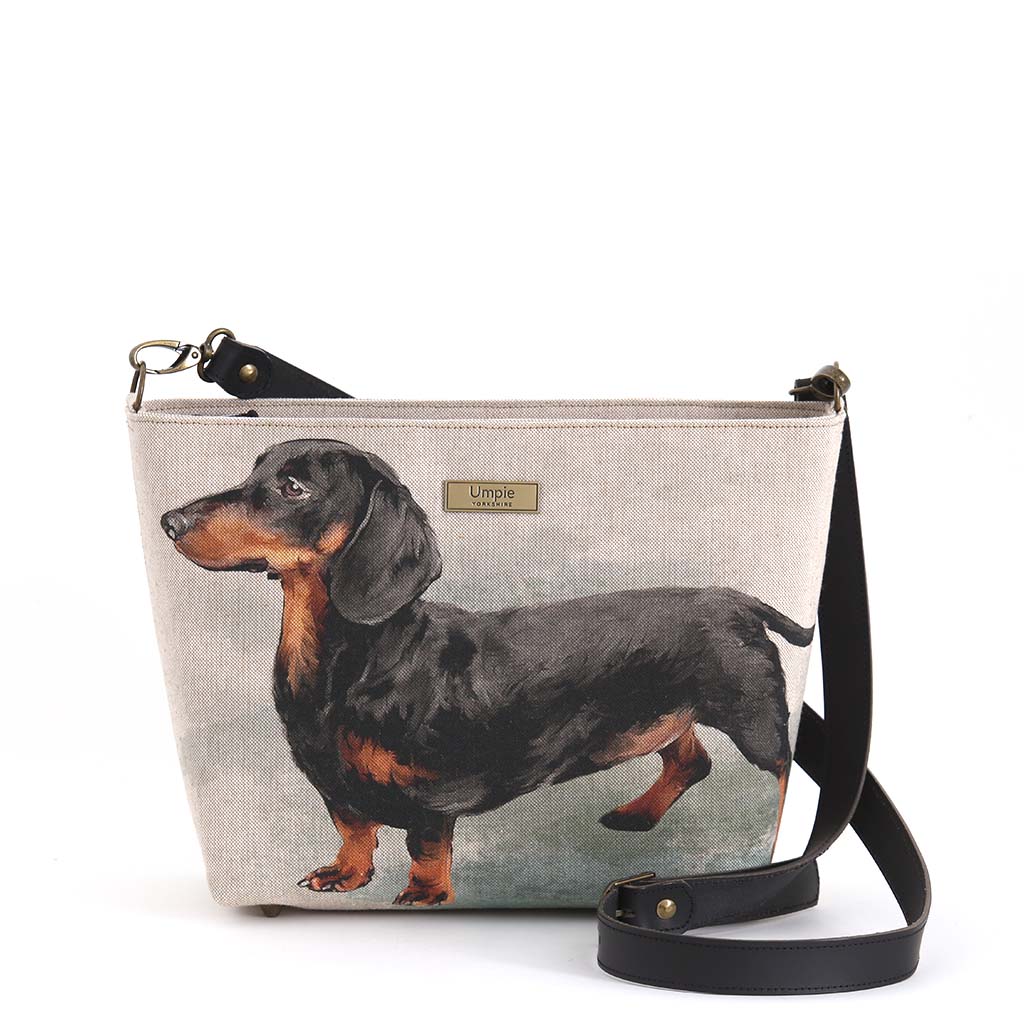 The Dachshund Crossbody Bag with a black leather strap by Umpie Handbags