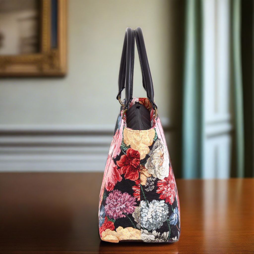 The Floral Tapestry Handbag with black leather handles - side view