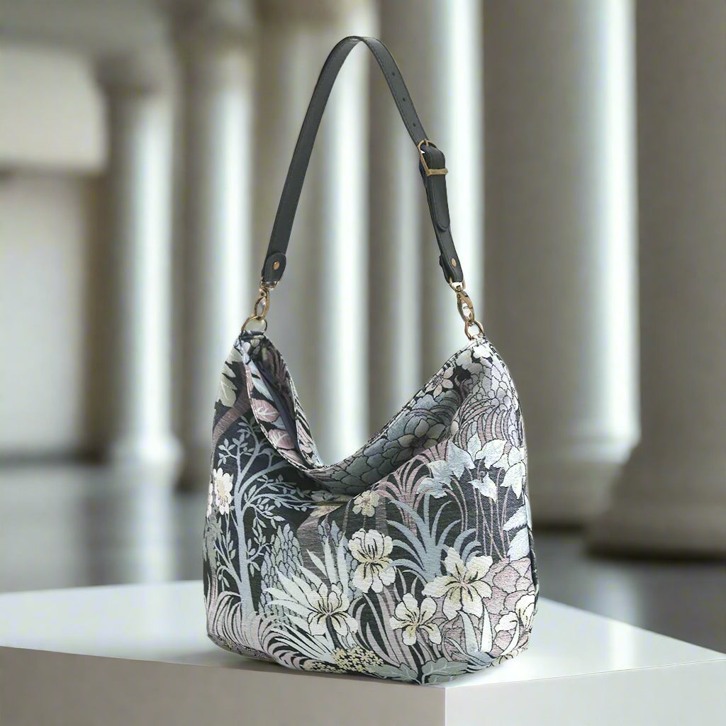 The Grey Floral Hobo Bag with a black leather strap