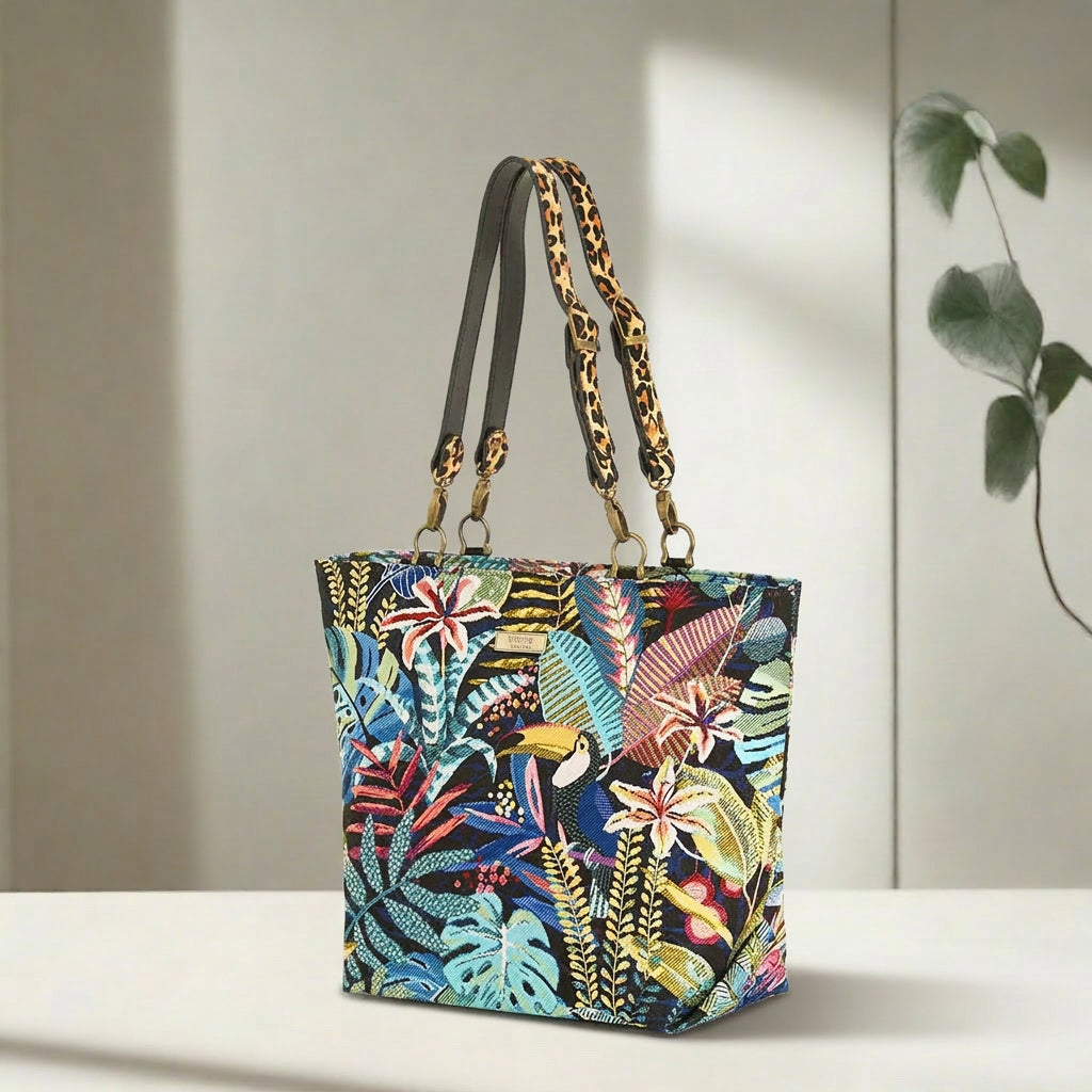 Floral Tote Bag showing vibrant botanical print and bold leopard leather straps by Umpie Handbags