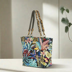 Floral Tote Bag showing vibrant botanical print and bold leopard leather straps by Umpie Handbags