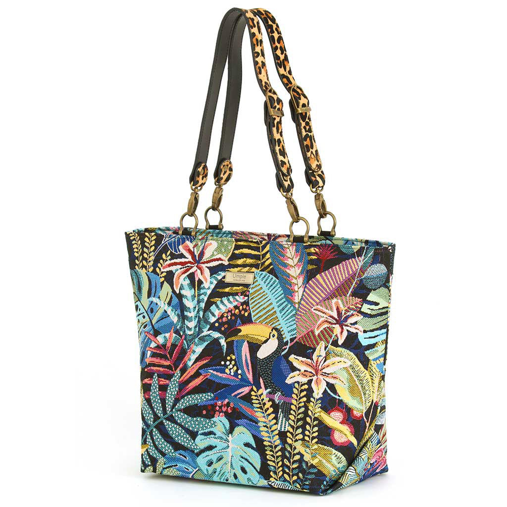 Floral Tote Bag showing vibrant botanical print and bold leopard leather straps by Umpie Handbags