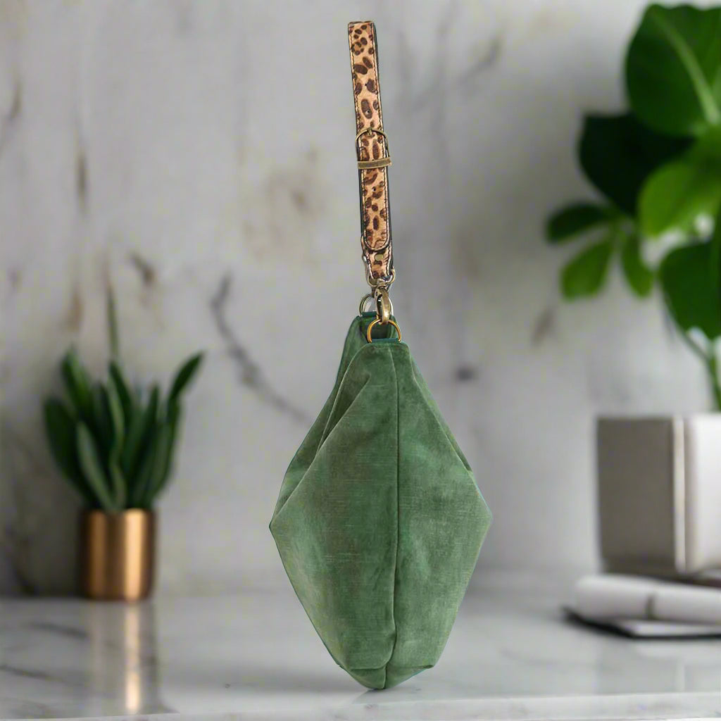 Luxurious green velvet hobo bag with bold leopard print leather shoulder strap and antique bronze hardware - elegant side profile by Umpie Handbags