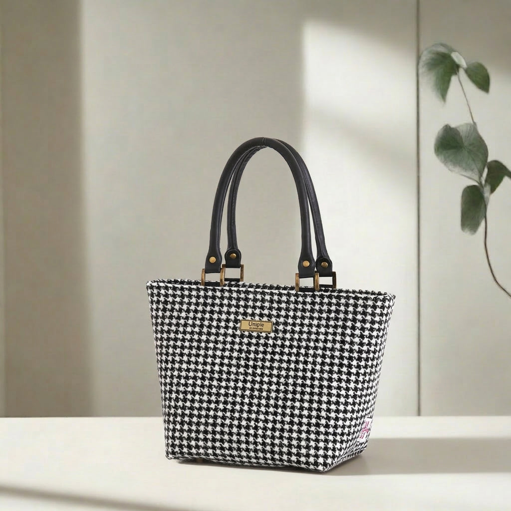 The Houndstooth Handbag by Umpie Handbags - British-made Harris Tweed handbag with classic black and white pattern and premium leather handles