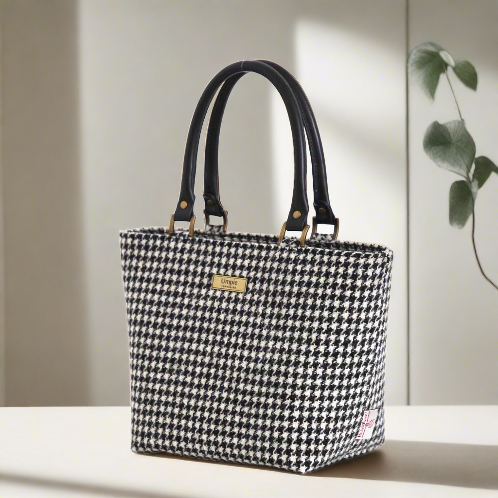 The Houndstooth Handbag with black leather straps