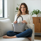 Classic black and white houndstooth Harris Tweed handbag with rich textured wool fabric, supple black leather handles, structured silhouette, authentic Scottish heritage weave, timeless houndstooth pattern, premium craft manship by Umpie Handbags