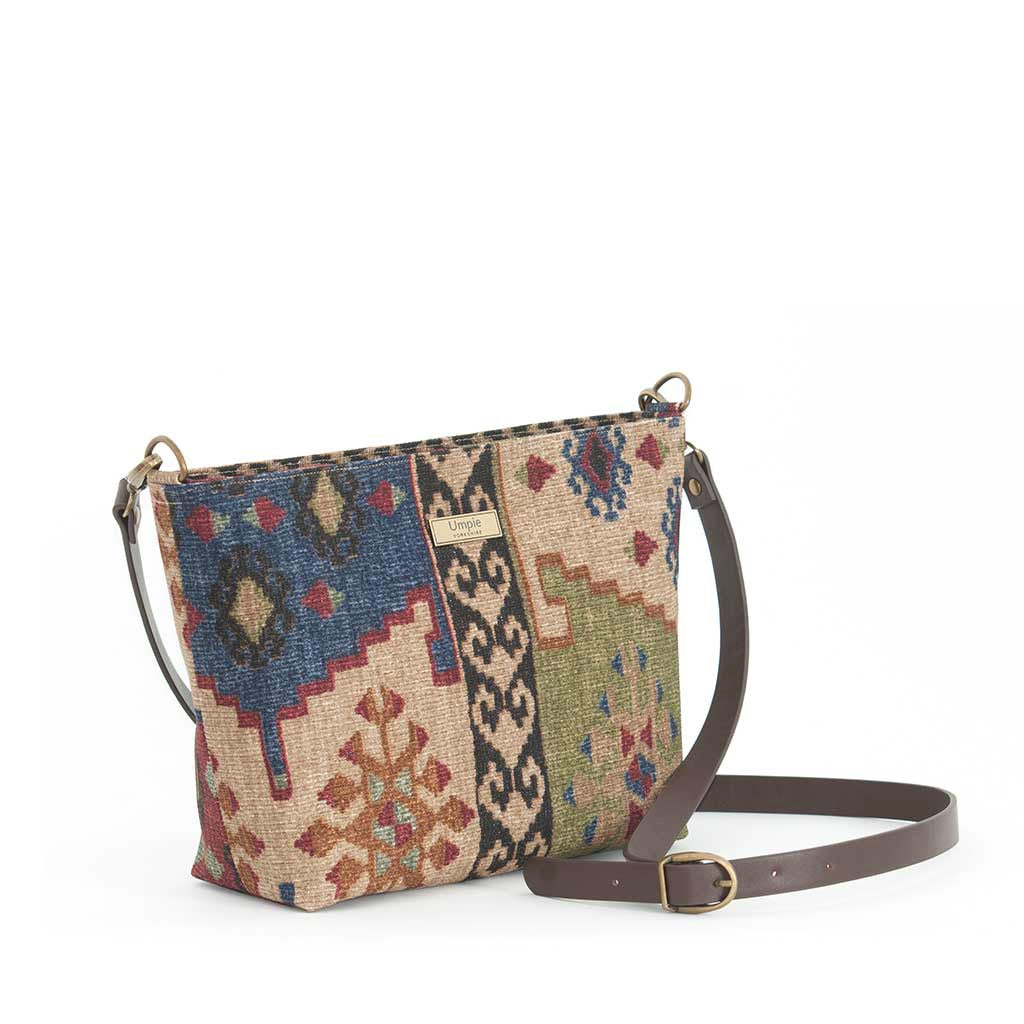 Navy/Green Canvas Crossbody Bag in a Kilim print design with a brown leather strap