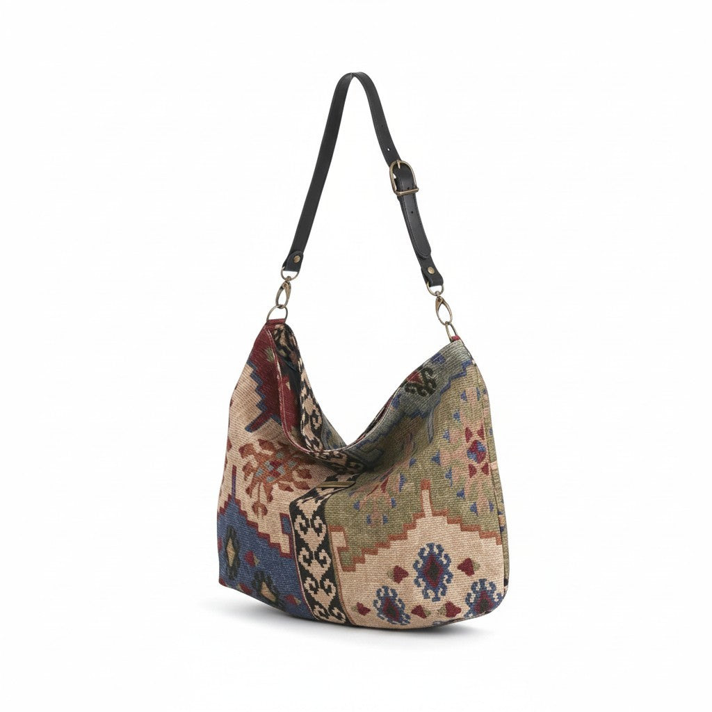 The Artisan Kilim Canvas Hobo Bag with a black leather strap by Umpie Handbags