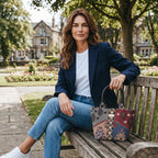 Kilim Canvas Handbag featuring vibrant kilim geometric pattern in rich burgundy, navy, and taupe tones with sturdy black leather handles, showcasing a structured everyday silhouette and authentic heritage textile weaving by Umpie Handbags