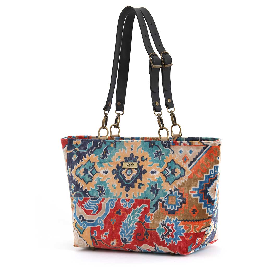 Kilim Velvet Shoulder Bag showcasing rich texture and traditional geometric design with black leather straps by Umpie Handbags