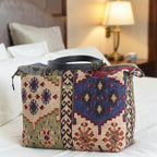 Canvas Kilim Weekend Bag resting in a hotel room, showcasing heritage geometric print and spacious design by Umpie Handbags