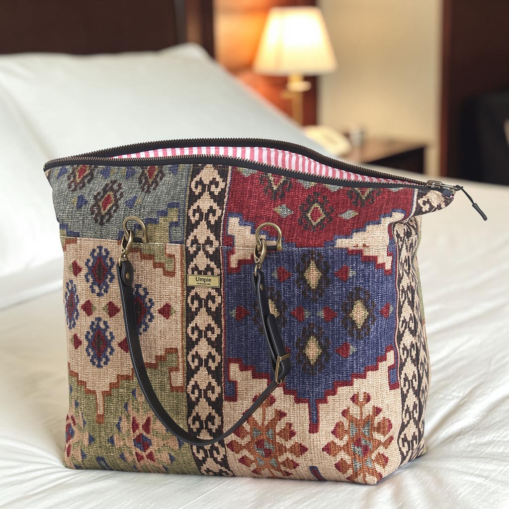 Open view of the Canvas Kilim Weekend Bag revealing fully lined interior and internal pocket, handmade in Great Britain by Umpie Handbags