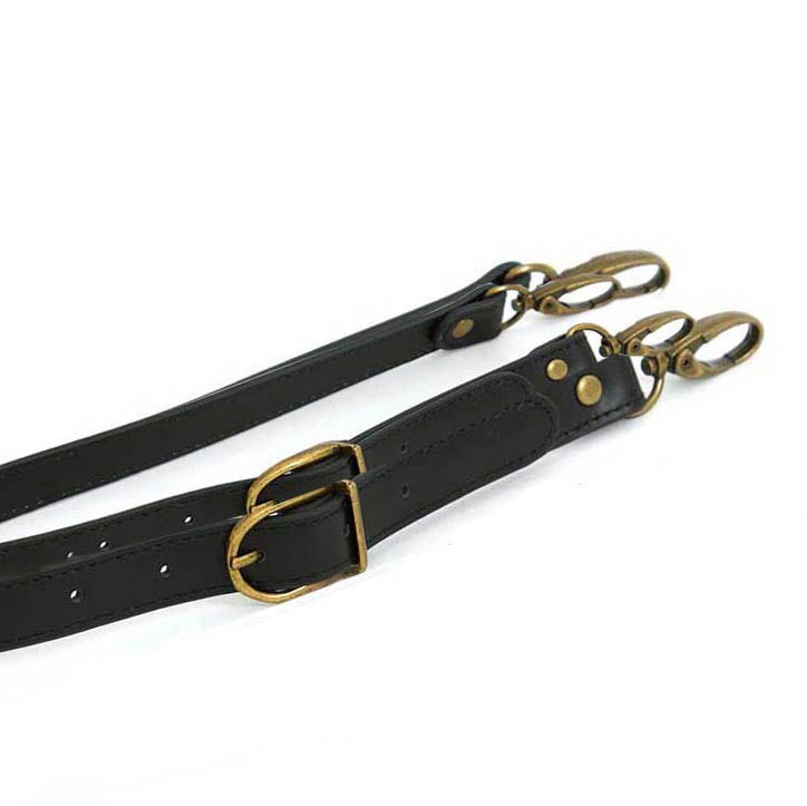 Black leather tote bag straps.