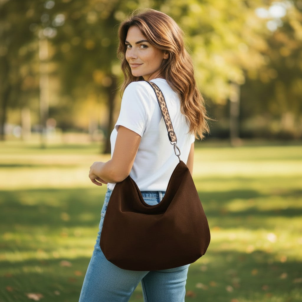Luxurious Mahogany velvet hobo bag with bold leopard print leather strap, front view showing rich texture and slouchy silhouette by Umpie Handbags
