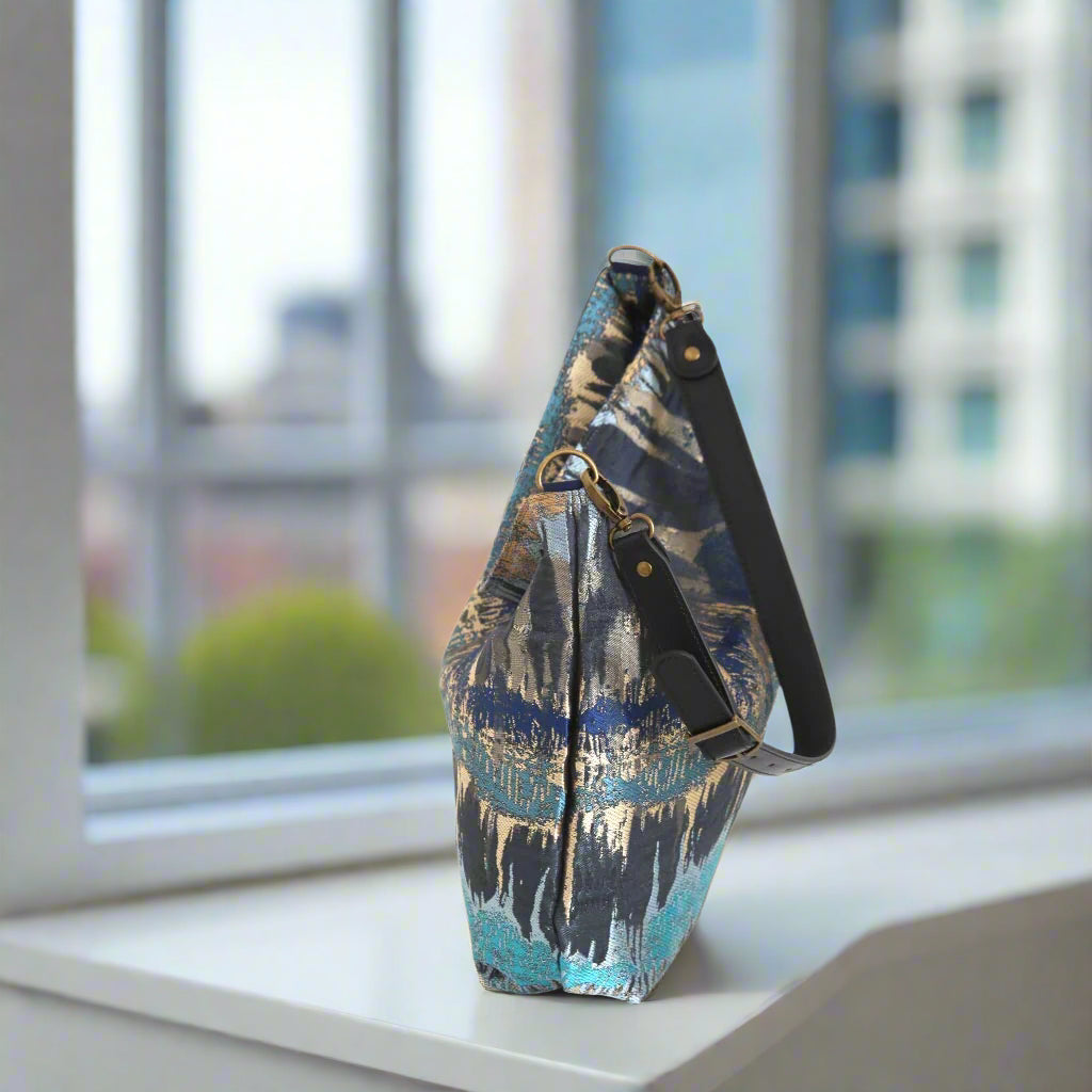 The Turquoise Metallic Hobo Bag - zip-top view