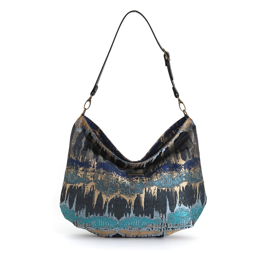 Teal Metallic Hobo Bag displaying relaxed hobo silhouette and adjustable black leather strap by Umpie Handbags