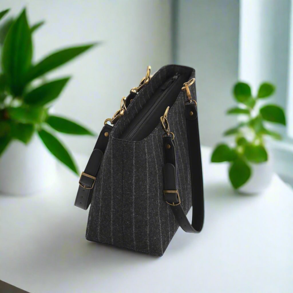 The Pinstripe shoulder bag with black leather straps - zip-top view