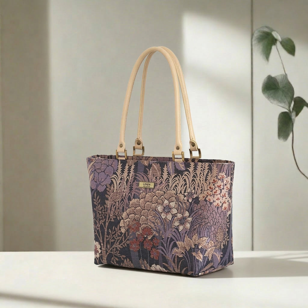 Purple Brocade Shoulder Bag showing shimmering metallic floral pattern and beige leather straps by Umpie Handbag 