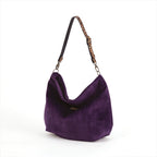 A purple velvet hobo hobo bag with a leopard print leather strap, shown on a plain white background, by Umpie Handbags