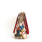 The zip-top  view of the red floral shoulder bag with red leather handles, handmade in Yorkshire by Umpie Handbags.