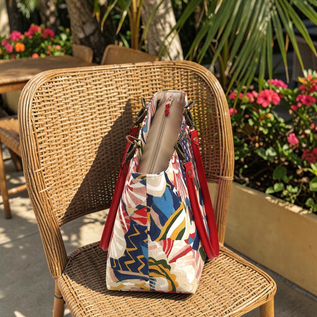 Top zip view of the Red Floral Shoulder Bag showing secure zip closure and bold floral fabric, by Umpie Handbags
