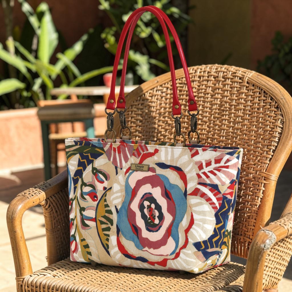 Front view of the Red Floral Shoulder Bag showcasing the vibrant floral design and rich colour palette, handcrafted in Great Britain by Umpie Handbags