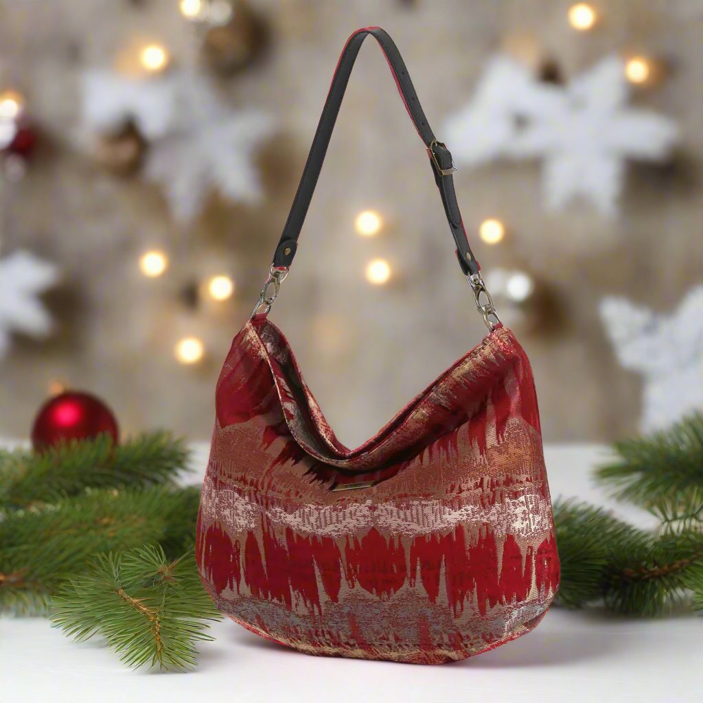 The Red Metallic Hobo Bag with a black leather strap