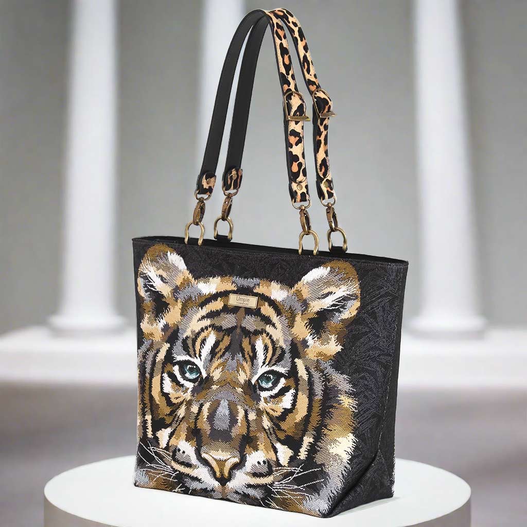 The Siberian Tiger Tote Bag, with animal print leather straps