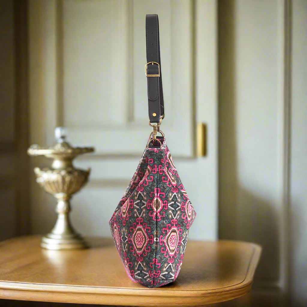 Tabriz velvet hobo bag side profile showing elegant curved silhouette, textured velvet fabric, and comfortable black leather strap by Umpie Handbags