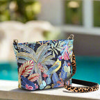 A Floral Crossbody Bag with a Leopard print leather strap - back view