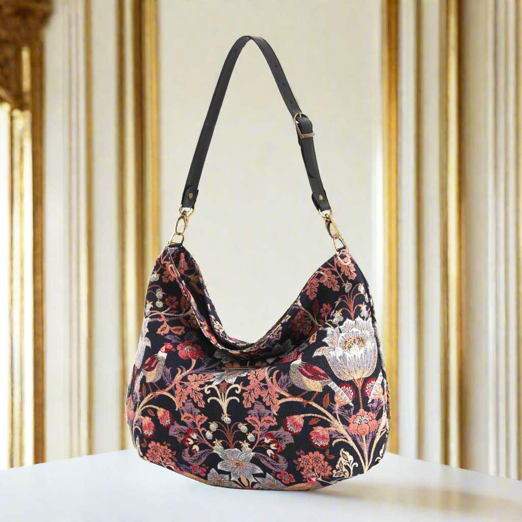 William Morris Hobo Bag - handcrafted brocade handbag with black leather strap, front view showing intricate botanical pattern by Umpie Handbags