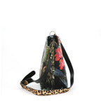 Side view of the luxurious printed velvet tiger crossbody bag with leopard print leather strap showing rich texture and exotic pattern by Umpie Handbags

