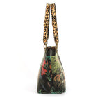 Side view of Velvet Tiger Shoulder Bag featuring sumptuous velvet with striking tiger stripes and leopard print leather straps by Umpie Handbags