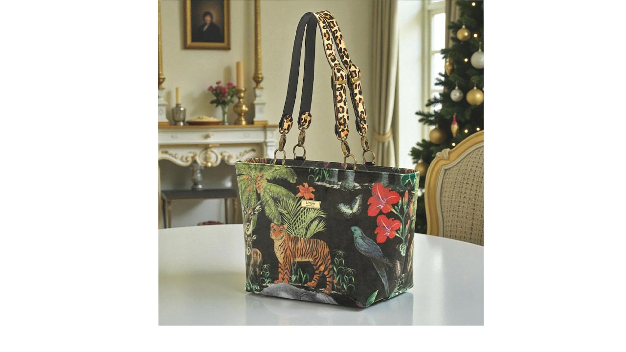Luxurious tiger-print velvet shoulder bag with soft plush texture, gold-tone hardware, and adjustable animal print leather strap, handcrafted by Umpie Handbags
