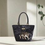 Front view of Tiger Handbag featuring striking tiger stripes on rich tapestry fabric by Umpie Handbags